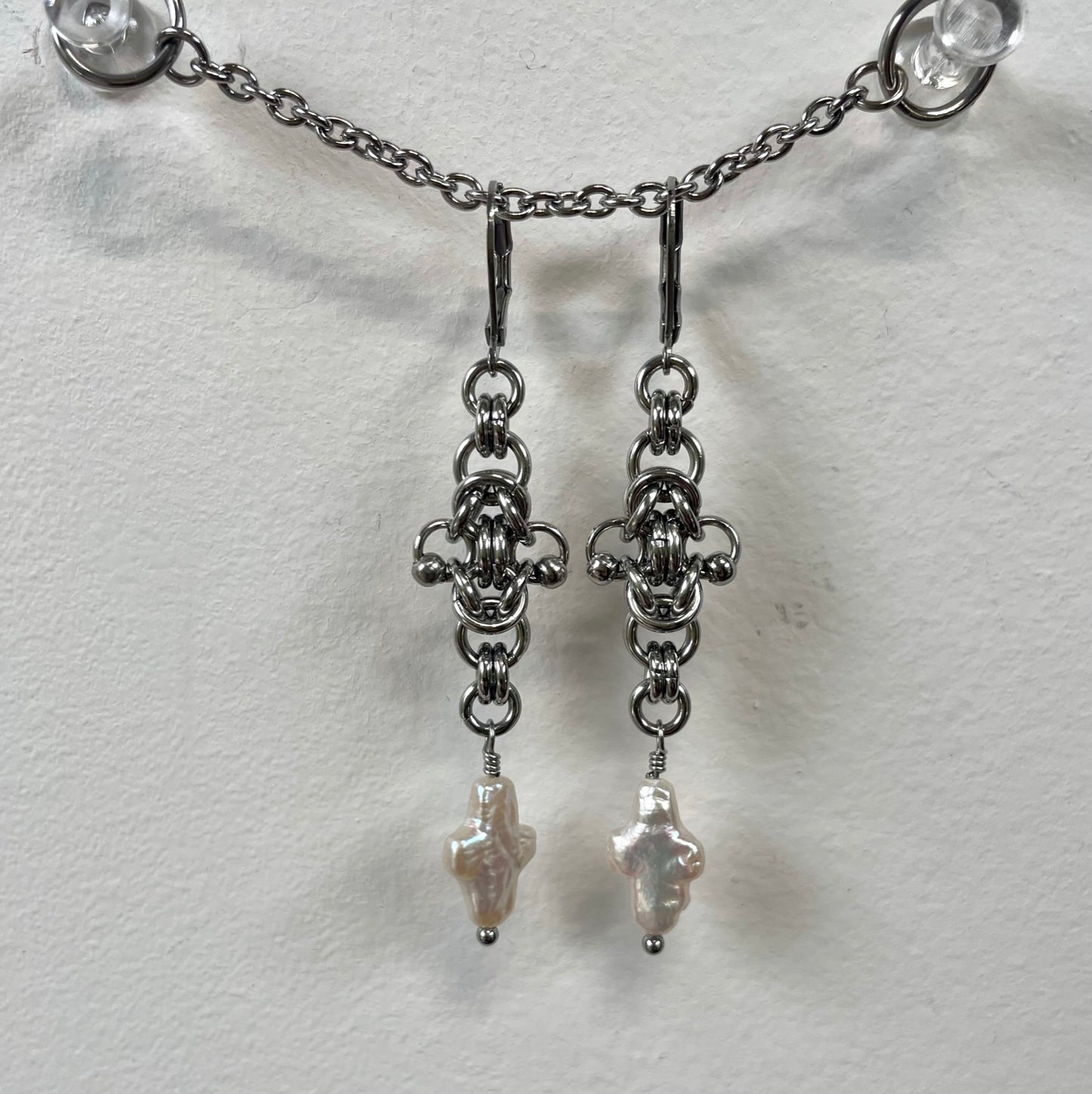 Dainty Chainmail and Cross Pearl Earrings.