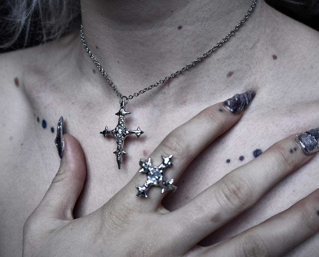 Crossed Fates Necklace.