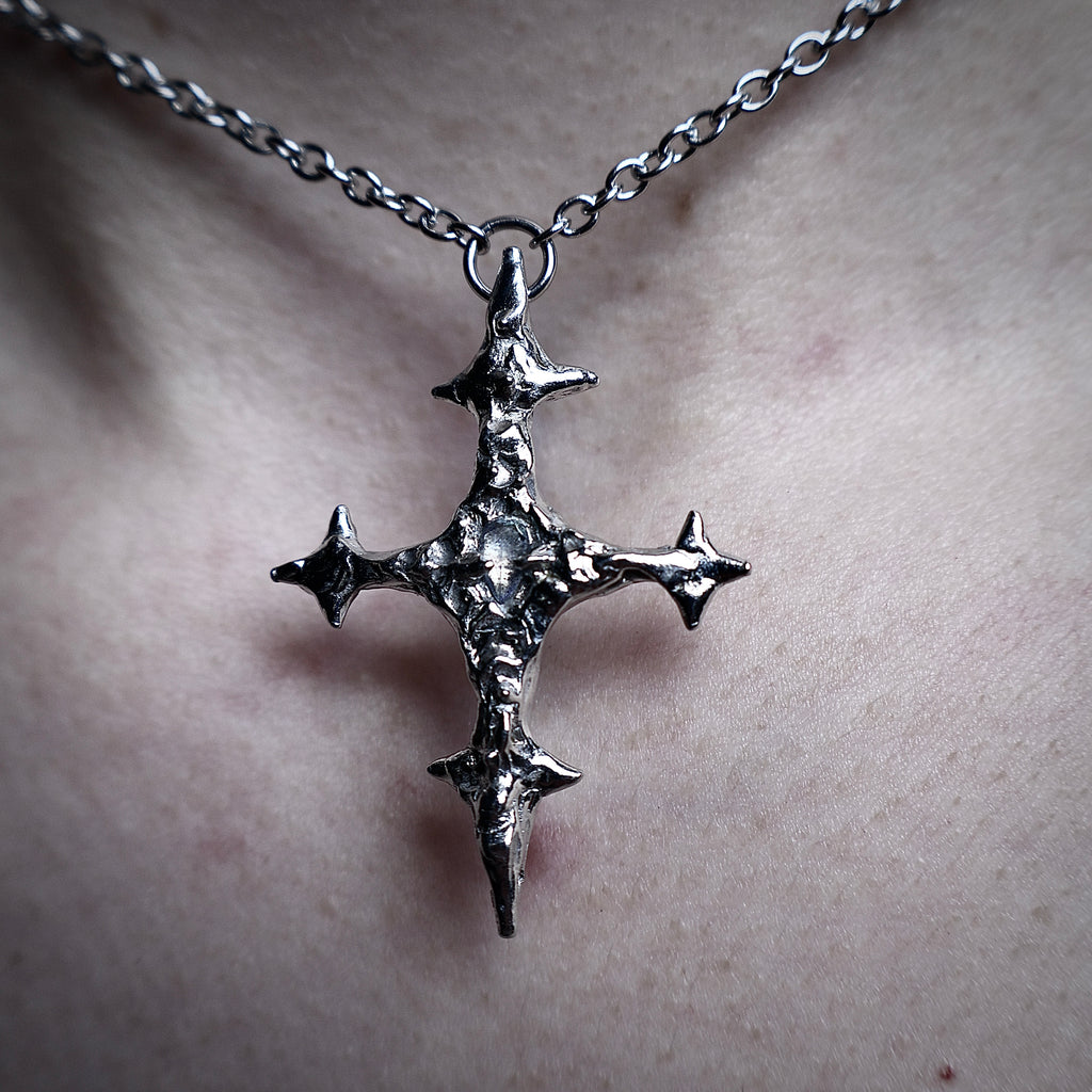 Crossed Fates Necklace.